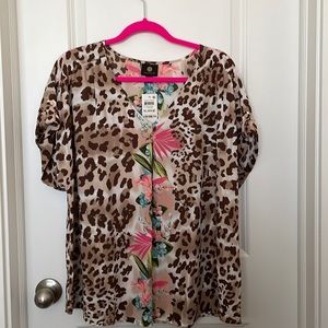 Woman’s leopard blouse.